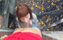 Redhead girl sucks cock in the woods